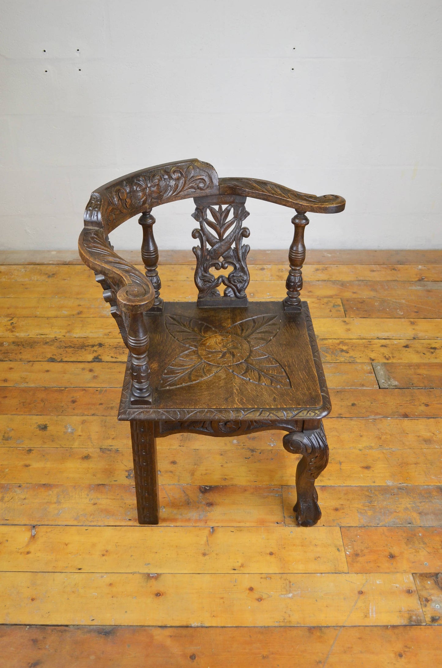 A Victorian Carved Oak Corner Chair